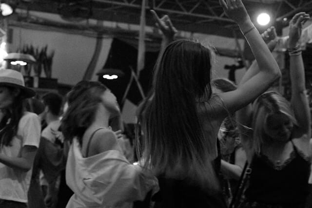 A dancer smiling in the middle of a turn